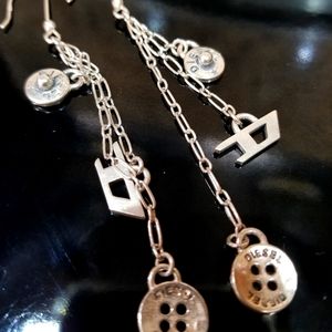 Women earrings s925, diesel.